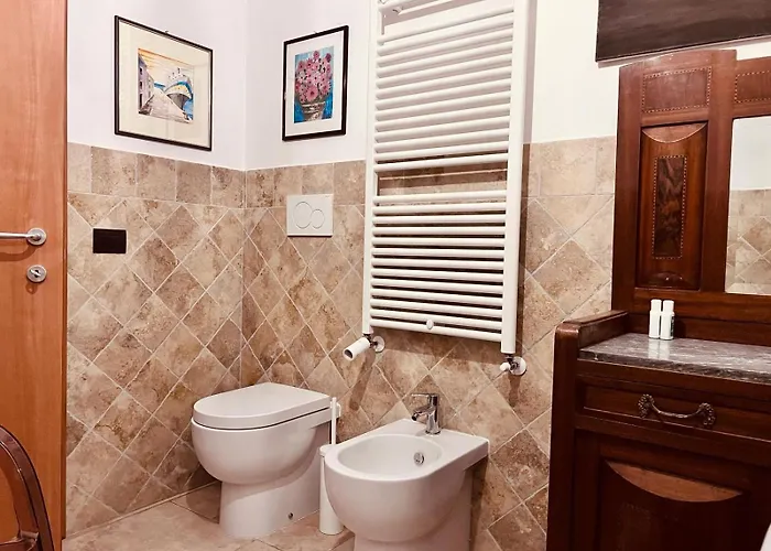 Questa Casa Non E Un Λ' Άκουιλα